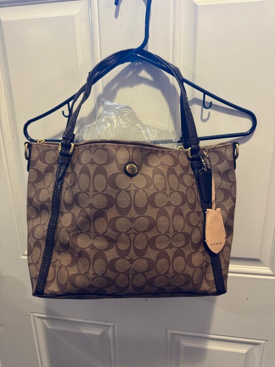Coach Handbags - Coach Peyton Signature East West Convertible Pocket Tote Bag Signature $298.00